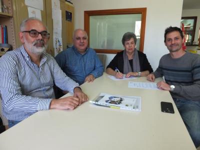 Membres de les dues entitats durant la firma del conveni